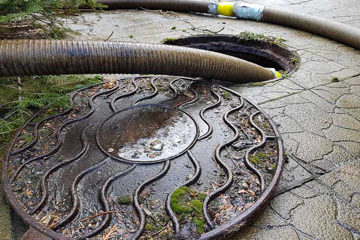 Pump station cleaning with vacuum hoses in Brooklyn,
